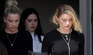 Tại sao Amber Heard được bồi thường 2 triệu USD?