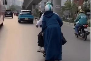 Nguy cơ TNGT rình rập khi mặc áo chống nắng sai cách